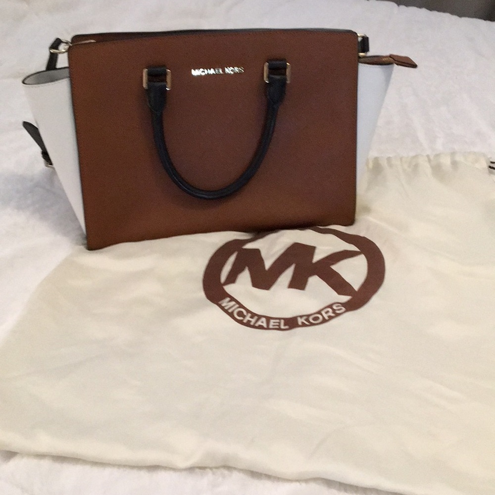 Authentic Michael Kors hard leather purse.
